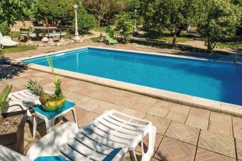 Otok Rab, samostojeća kuća s bazenom na posjedu od 1280 m2