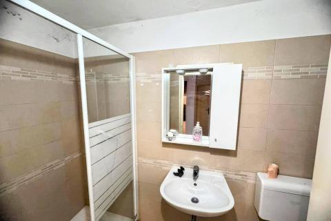 OTOK KRK,KORNIĆ kuća u nizu sa garažom i dvorištem