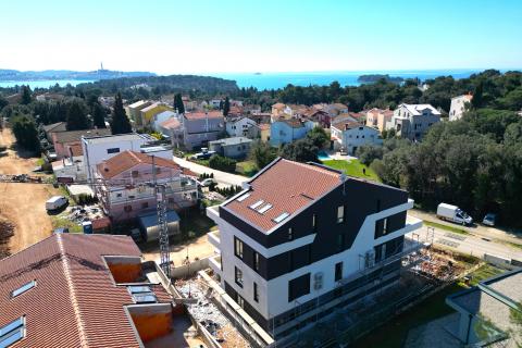 Rovinj,-stan u novogradnji,+parking mjesto+vrt200m2-blizu mora