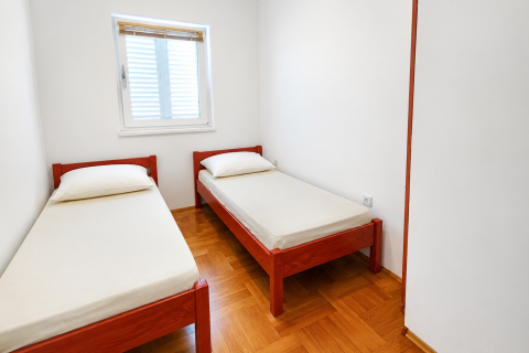 Malinska &ndash; Ground Floor Two-Bedroom Apartment with Private Garden