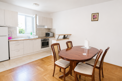 Malinska &ndash; Ground Floor Two-Bedroom Apartment with Private Garden
